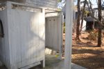 Enclosed outdoor shower between garage and main house